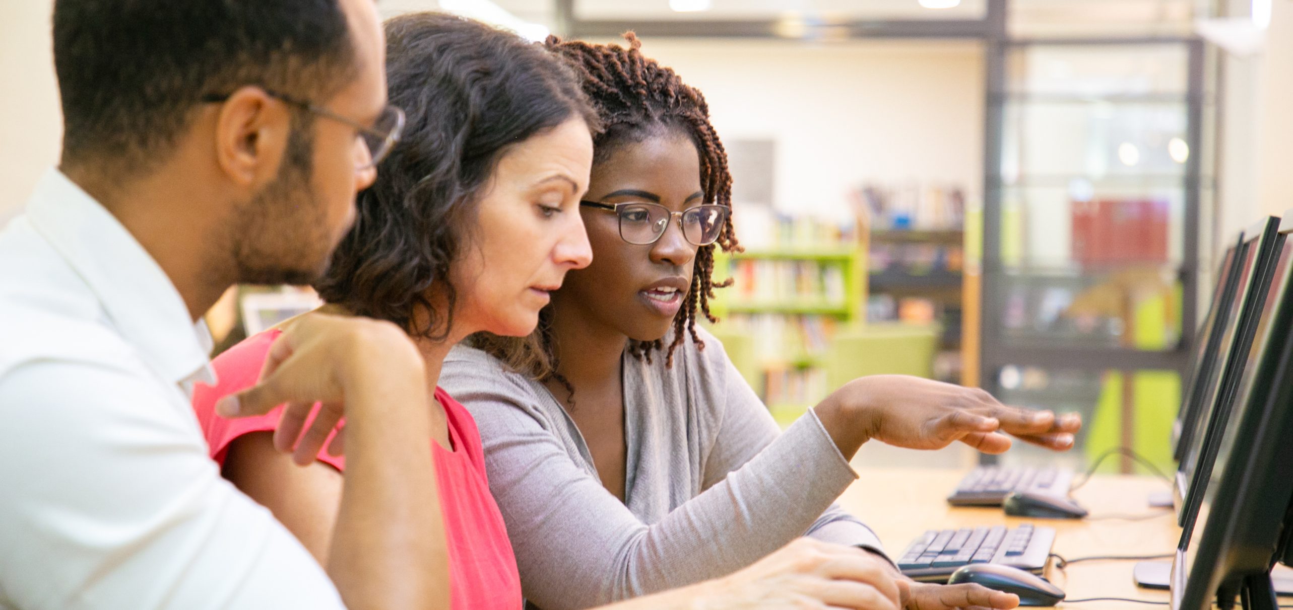 Instructor explaining corporate software specific to trainees