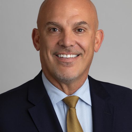 Portrait photo of Dr. Kent Paredes Scribner