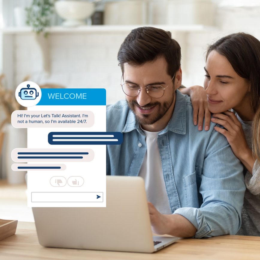 Man and woman looking at laptop with chatbot on screen