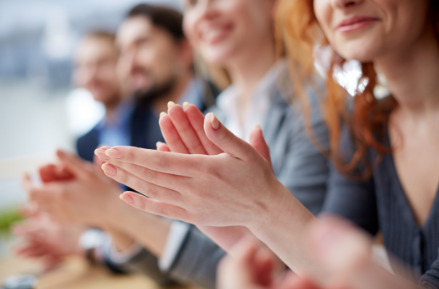 Women clapping
