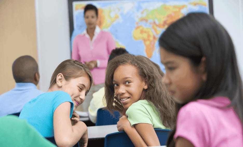 Student being made fun of at school in a classroom setting