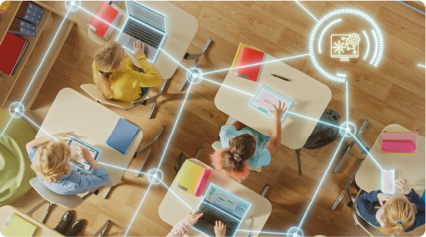 How AI is transforming IT Support in K12 Schools image of students in a classroom with various connected devices - K12 Insight