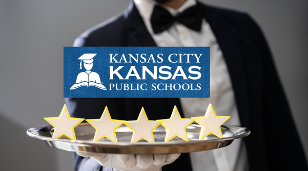 A tuxedoed server holds a silver platter with five stars underneath the logo for Kansas City Public Schools